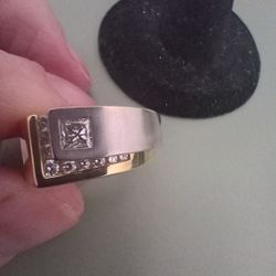 Man's 14k Two Tone With Diamond.