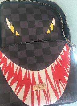 Reason brand mini bookbag