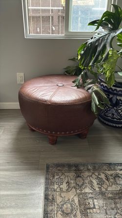 Brown leather ottoman