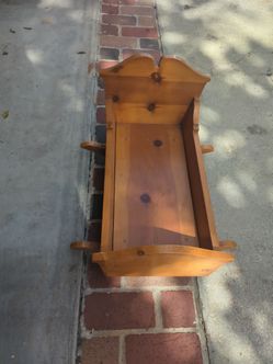 Vintage wooden doll cradle