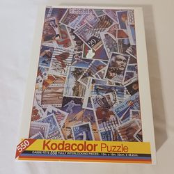 Vintage Kodak color stamp collection 550 piece puzzle sealed in the Box
