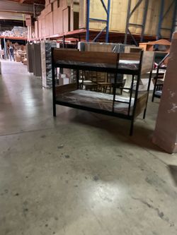 Twin bunk bed. Available in espresso. Bunk bed only-$220. With mattresses-$399. Assembly required. Assembly not included. Tax included. Free delivery.
