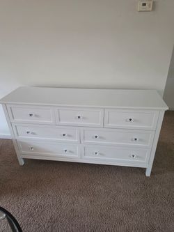 White dresser with crystal knobs