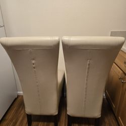 2 Good Leather Chairs: 40$ Each. 