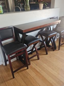 Bar height table and chairs