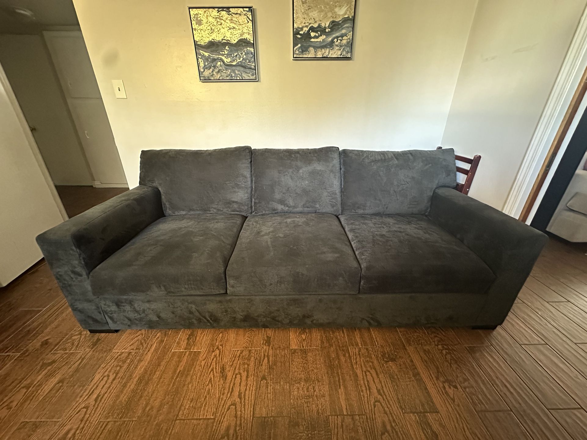 Dark gray sofa couch