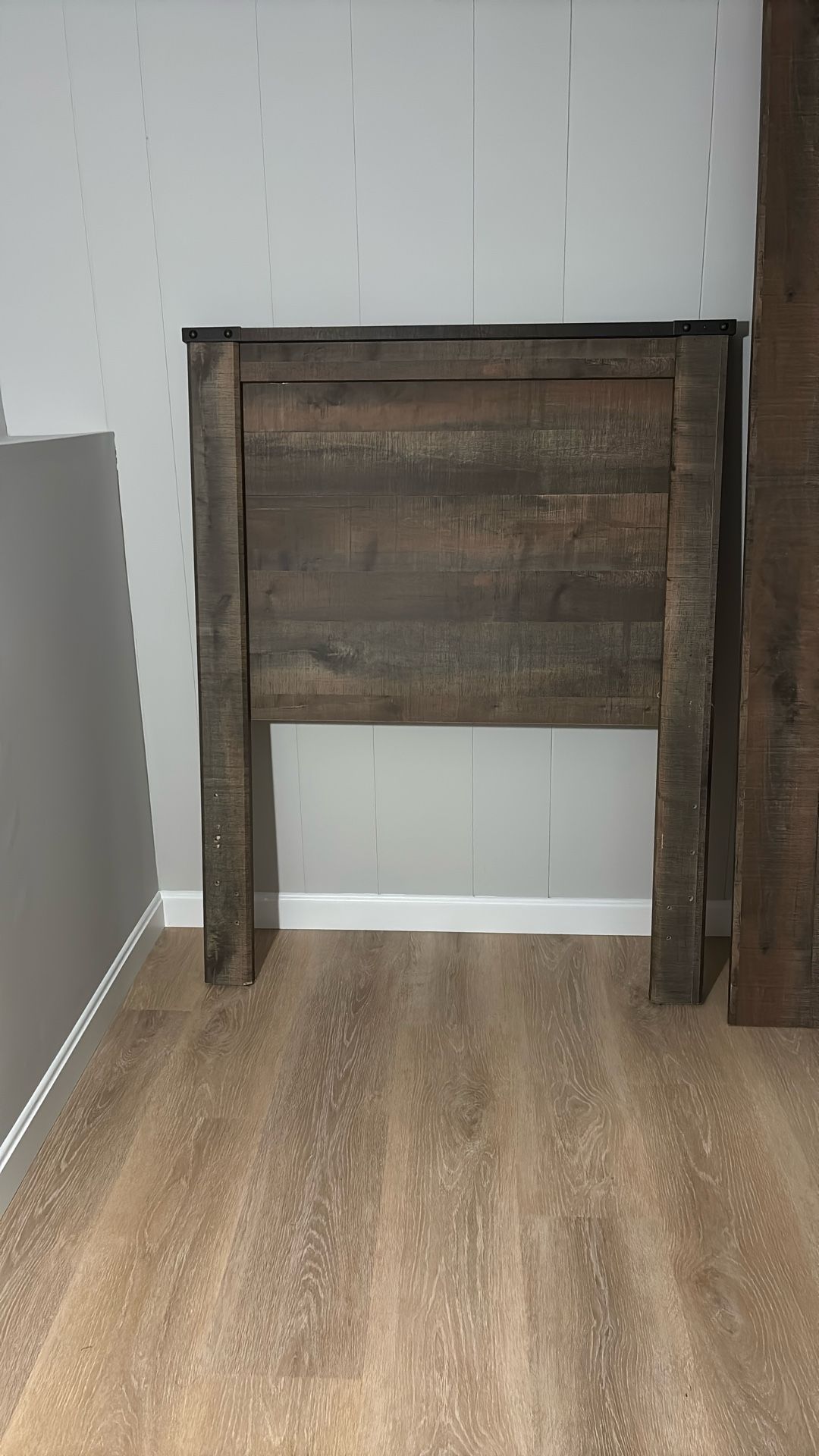 Twin size bed frame without mattress.