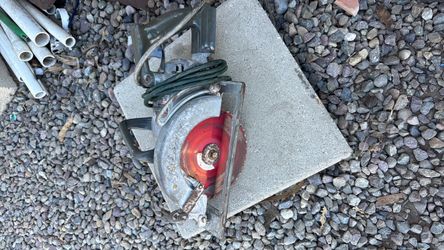 classic heavy-duty model like the HD77 or Model 77 with a red blade guard and a 7-1/4-inch blade.