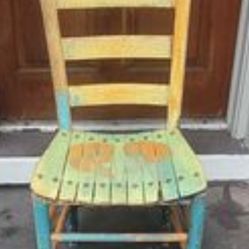 Distressed wooden vintage hand painted chair