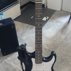 GUITAR WITH STRAP AND STAND CLICK ON THE PICTURE YOU WILL GET FULL PICTURE SIZE 