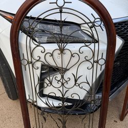 DECORATIVE WALL ART. 26"w x 31 1/4"high; curved at top,  cross streets are Arapaho & Waterview 