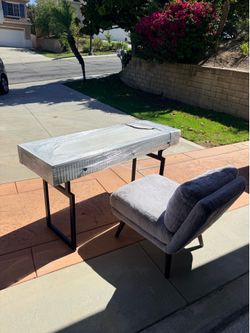 white desk with charging ports