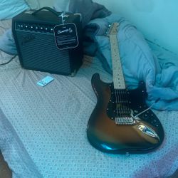 squire Stratocaster Electric Guitar with Amp 