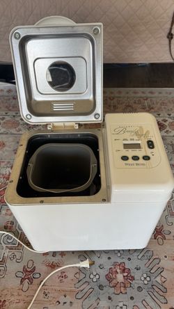 The West Bend Automatic Bread & Dough Maker (such as Model 41040 or 41047) is a countertop