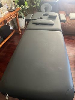 Massage table