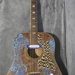 GUITARRA ACOUSTICA $180