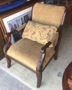 Wood formed armed chair