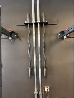 Titan bars x2  Olympic bar x2 Ez bar ,  and bar holder