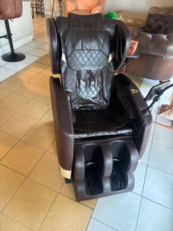 Full-body zero-gravity massage chair.. programable with display. $900