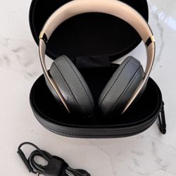 Gold And Space Gray Beats By Dre Studio Pro Wireless headphones