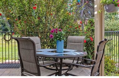 Patio glass table and 4 chairs