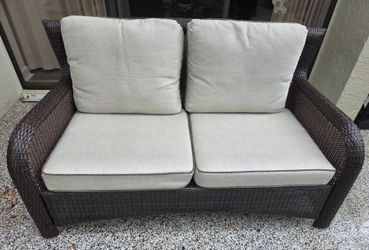 Patio sofa with cushions