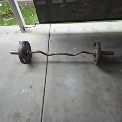 Curling Bar With 25 Lb Weights 