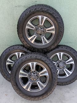 For sale set of rims and tires AT 265 65 R17