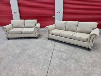 Nailhead couch and loveseat