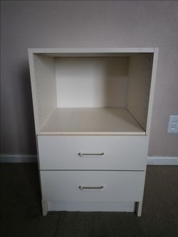 White shelf/nightstand with drawers and cubby
