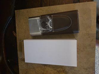 Cigar case and cigar cutter