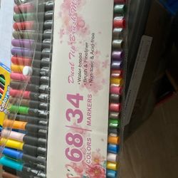 Markers And A Pen In One