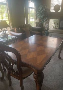 Solid wood dining table and 6 chairs