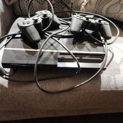 Playstation 3 Plus 2 Controllers