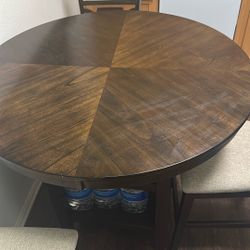 Ashley’s Dining Table With 4 Barstool Chairs