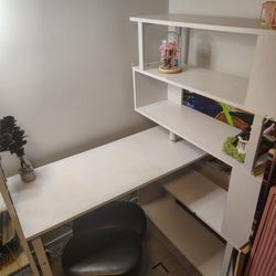 White rotating desk with shelving