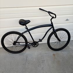 Dark blue beach cruiser bike