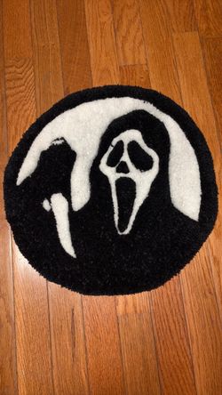 Ghost face tufted rug
