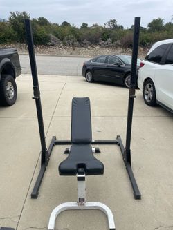 Squat rack, bench and treadmill