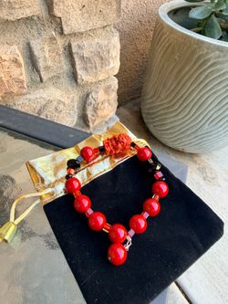 Red Beaded Bracelet with Carved Focal Bead