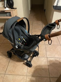 Graco GoMax travel system with car seat, base and frame stroller