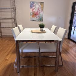 Extendable glass dining table + 4 chairs