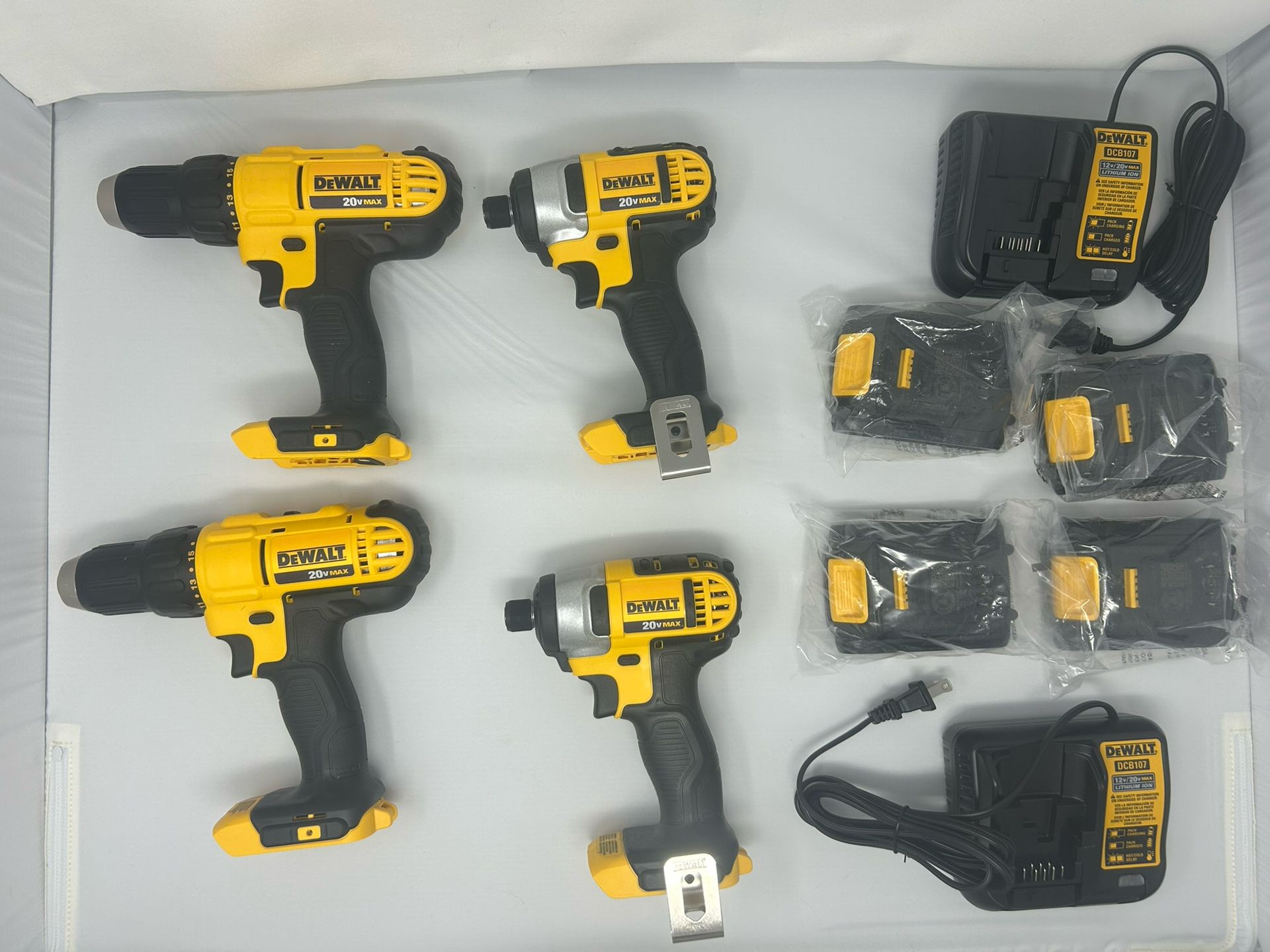 4 Brand New DEWALT Drills ( 4 New Batteries)