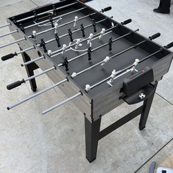 Foosball table, pool, air hockey, etc