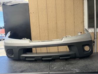 2009 2010 2011 2012 2013 2014 2015 2016 2017 NISSAN FRONTIER FRONT BUMPER COVER OEM USED