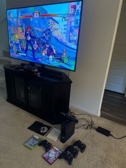 Xbox 360  with 4 controllers and 4 games