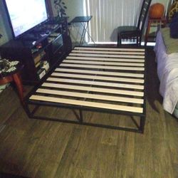 Zinus from Target Full Size 10" High Black Metal Frame With Wood Slats.