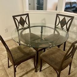 Glass top dinette table and 4 chairs 