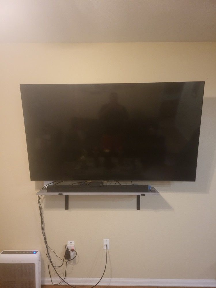 Samsung 75" ..Samsung Soundbar Including Speaker ( Not Shown)