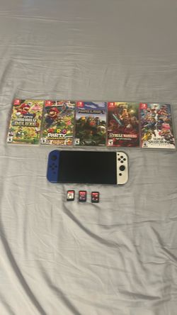 Nintendo Switch OLED with 8 Games Bundle + accessories